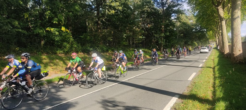 Header of lots of cyclists on the road